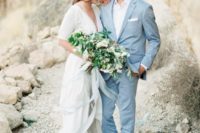 20 a light blue suit paired with a white shirt is a cool effortlessly chic groom’s look for a coastal or beach wedding