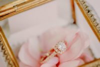 The ring was in the transparent box with a pale pink rose