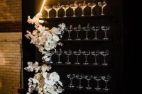 a cute champagne wall for a wedding