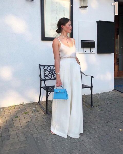 a casual bridal look with a spaghetti strap top, wideleg palazzo pants and some jewelry plus a blue bag