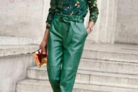 a dark green floral shirt, emerald leather pants, silver shoes and a bold clutch are a lovely look for a fall wedding
