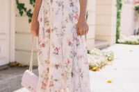 a delicate and subtle floral midi dress with short sleeves and a V cut, nude heels and a blush bag