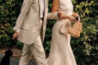 a neutral windowpane pantsuit, a white t-shirt and white mules and a sleeveless top, a poleated maxi skirt and strappy shoes for a wedding