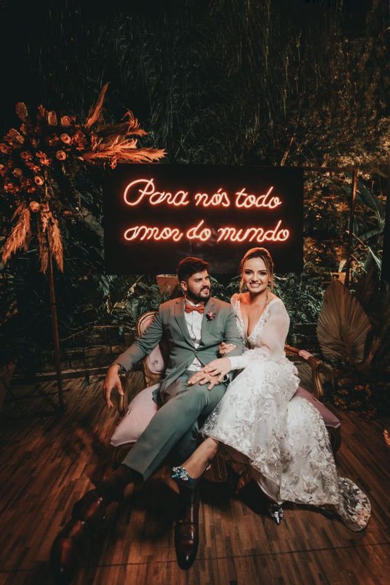 a wedding lounge with a neon sign to make it bolder, cooler and more modern is a funny and lovely idea