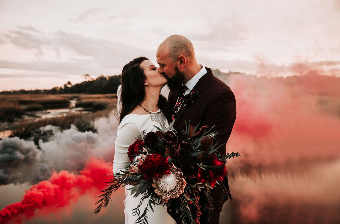 bold red and grey smoke that creates a mood and an impression in the photo
