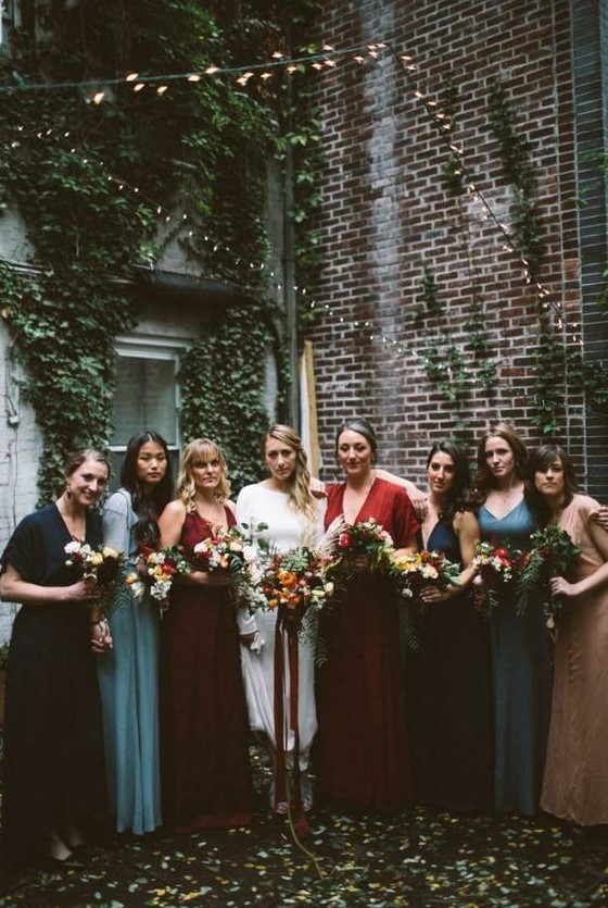 bright mismatched boho bridesmaids' dresses in blue, navy, red, burgundy and light blue