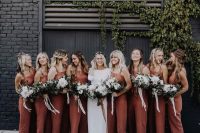 burnt orange midi fitting bridesmaid dresses with wide straps and mules for a boho wedding