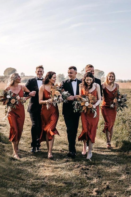 classic burnt orange slip bridesmaid dresses with mismatching shoes for an elegant fall wedding