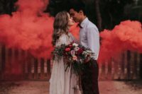 highlight you two with bright coral smoke clouds that will make your couple stand out a lot