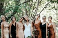 lovely blush, rust and black slip midi bridesmaid dresses and black lace up heels for a boho fall bridesmaid dress