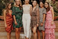 mini and midi mismatching bridesmaid dresses with various prints are amazing for a bold boho wedding