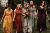 mismatching lace and plain bridesmaid dresses in yellow, rust, deep purple and sage green are adorable for a fall boho wedding