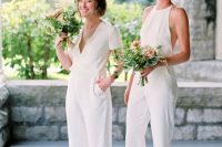 mismatching white bridesmaid jumpsuits with pockets and various shoes for a modern wedding