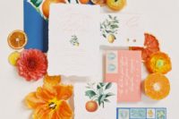 02 The wedding stationery was done in bright blue and coral pluus citrus prints