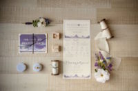 02 Their invitation suite was done in purple and lilac and featured Northern Lights
