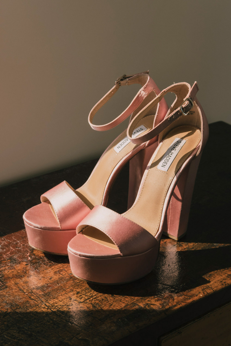 Her shoes were pink platform ones to match the girlish yet bold look