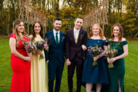 The bridesmaids were rocking mismatched dressed in autumn colors and jewel tones