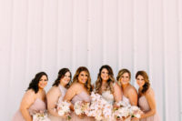 04 The bridesmaids were rocking mismatching blush maxi dresses