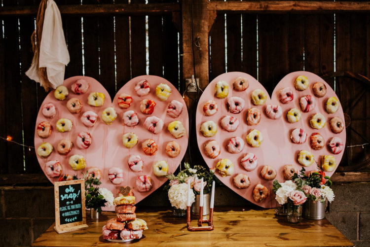These heart donut walls were also DIYed by the brides themselves
