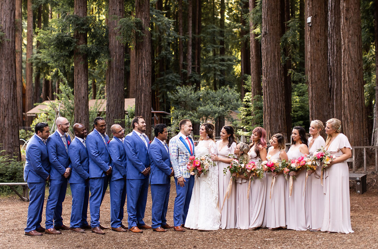 The groomsmen were wearign cobalt suits and the bridesmaids were rocking blush maxi dresses