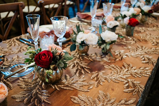 mini centerpieces looks great on this wedding table