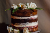a rustic naked wedding cake