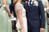 10 stylish and elegant looks with sage green maxi bridesmaid dresses and navy three-piece suits for groomsmen