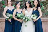 11 simple navy spaghetti strap maxi dresses and greenery and white bloom bouquets for a chic and bold navy and green wedding