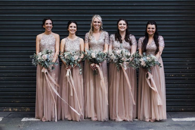 The bridesmaids were wearing gorgeous blush maxi dresses with sequin bodices and pleated skirts
