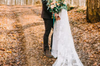 03 The bride was wearing a lace sheath wedding dress with a cape and a half updo, the groom was wearing a brown tweed three-piece suit with a bow tie and brown shoes