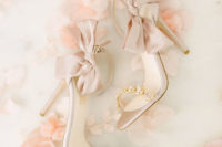 03 The bride was wearing chic blush heels with embellishments and large fabric bows