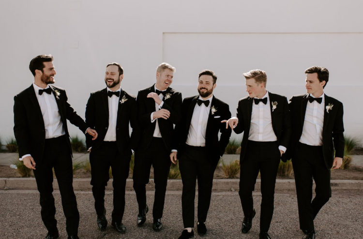The groom and gents were rocking black tuxedos