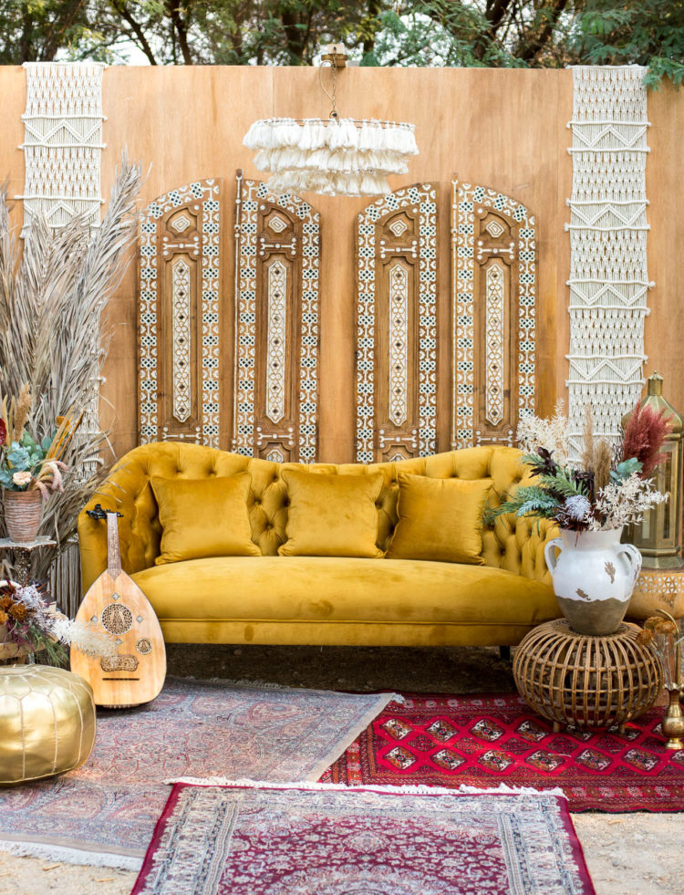 The lounge was truly boho, in burgundy and mustard shades, boho rugs and macrame and tassels