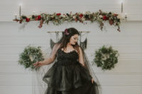 05 The second bride was wearing a black strapless wedding dress and a long veil