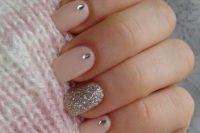 07 a shiny blush wedding manicure with rhinestones and a silver glitter ring finger for a chic and glam look