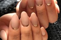 12 matta neutral nails with gold stickers that will give a shiny and modern feel to your manicure