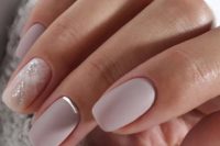 14 matte lilac nails with a touch of silver and an accent watercolor nail in white and silver for a winter bride