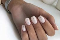 17 shiny neutral nails with silver vertical stripes are a modern and fresh idea for a bride