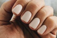 20 a shiny off-white wedding manicure is always a stylish idea for a bride, it will work for any style