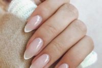 21 almond nails with a slight French manicure is a chic and stylish idea with a modern feel