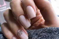 22 blush nails with a tiny quote on the ring finger – choose your favorite quote about love and relationships