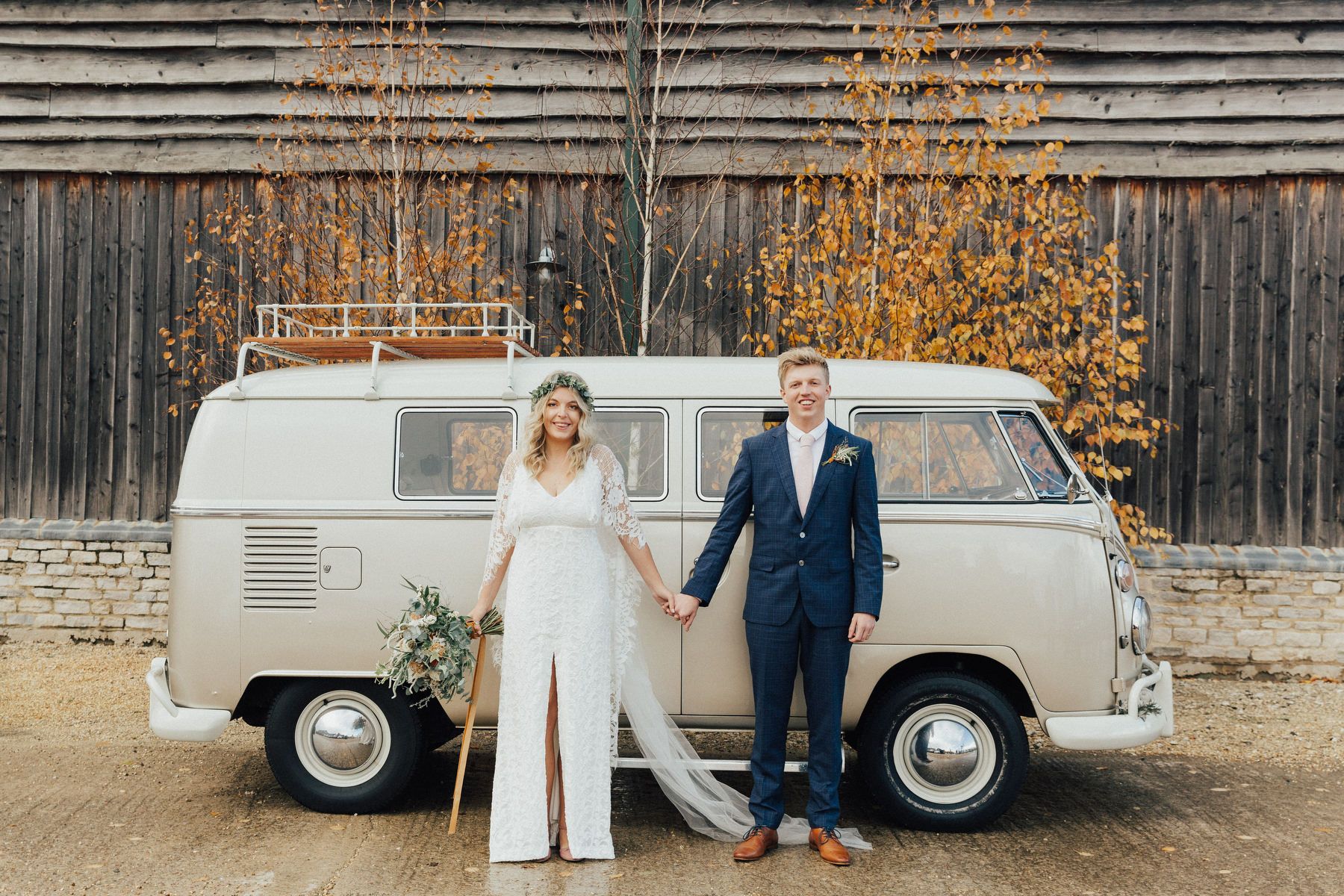 This couple went for a laid back boho fall wedding with lots of greenery and pumpkins