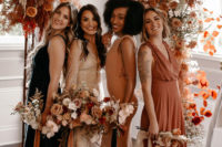 03 The bridesmaids were wearing mismatching maxi dresses in various colors and of various fabrics