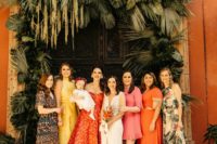03 The bridesmaids were rocking mismatching dresses in various muted shades – pink, red, yellow, rust and also printed ones