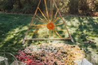 03 The wedding altar was inspired by the sun and was done with hand-dyed cloth