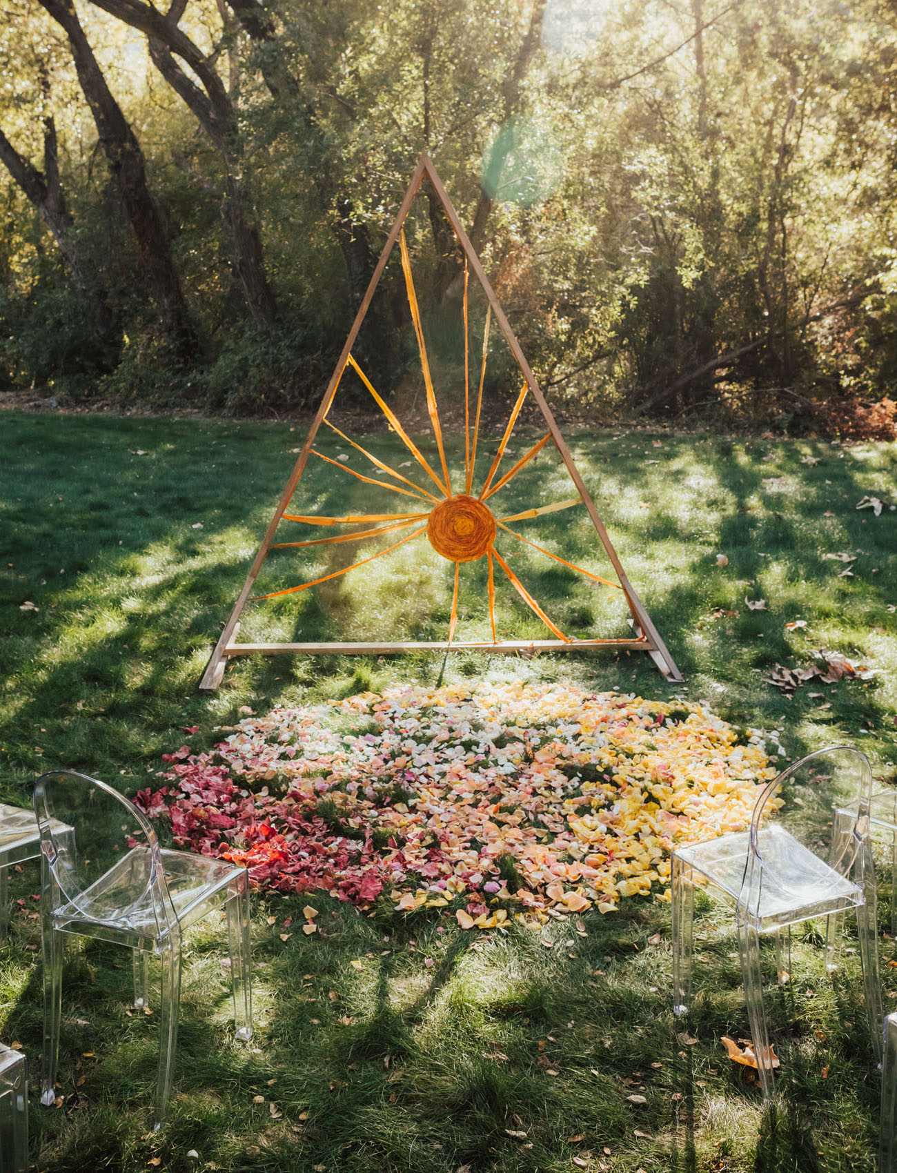 The wedding altar was inspired by the sun and was done with hand dyed cloth