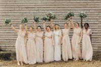 05 The bridesmaids were wearign matching blush maxi dresses with lace bodices