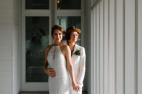 05 The second bride chose a boho lace fitting wedding dress with a halter neckline and rocked an updo