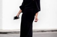 05 a black velvet off the shoulder midi dress with long sleeves, ankle strap shoes in black with pompoms