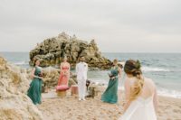 06 The ceremony space was right on the beach, with a chic lounge – stools and candle lanterns